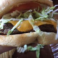 Impossible burger with vegan cheese, vegan mayo, lettuce, tomato & onion 😍 at Aleko's 2 Go in Hagerstown