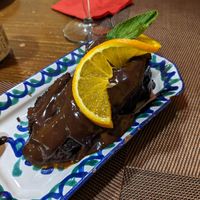 Brownie with an orange chocolate sauce at El Piano in Granada