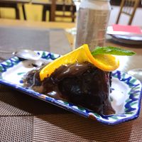 "Brownie" - chocolate cake with orange garnish at El Piano in Granada