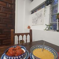 Media racion de albondigas y una de crema de puerro at El Piano in Granada