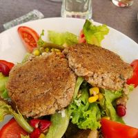 Buchweizenlaibchen auf Blattsalat at Klostergasthof des Stiftes Heiligenkreuz in Heiligenkreuz
