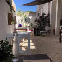 Cute garden seating area at Chaya & Cacao in Isla Mujeres