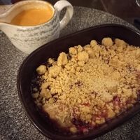 Crumble with vegan custard at The Harrow Inn in Warlingham
