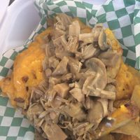 Jackfruit mushrooms poutine.  Greasy.  It was okay.  at The Gentle Crumb + Eco Refillery in Barrie