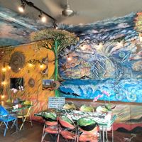 The art inside is beautiful ❤️ at Pele's Kitchen in Pahoa