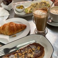 Breakfast! (chocolate hummus toast and vegan croissant with vegan chocolate and a hazelnut latte, my mum’s option wasn’t vegan, she had avocado toast with scrambled eggs)  at Bar Poxé in Mallorca