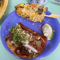 Street corn and birria taco  at Jajaja Mexicana - Williamsburg in Brooklyn