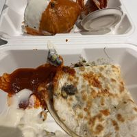 Burrito & quesadilla (spilled during delivery )  at Jajaja Mexicana - Williamsburg in Brooklyn