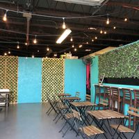 Indoor seating area with fans at Mission Kitchen - Food Truck in Orlando