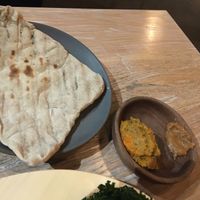 House made flatbread with carrot and some other dip.  Also so good! at Vicia in St Louis