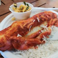 Enchilada with mango salsa and rice at Sealantro in Vero Beach