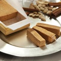 Turrón a la piedra is a typical Spanish nougat made with almonds, cinnamon, lemon and sugar. It is completely vegan and is very traditional for Christmas season.
 at Planelles Donat in Barcelona