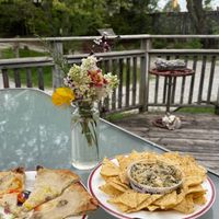 Artichoke dip was amazing! Apiecalypse pizza was amazing too! at Coven Plant Based Marketplace in Hamilton