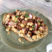 Smashed chickpea toast at Fiddlehead Fern Cafe in St Louis