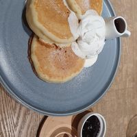 Pancakes with whipped soy cream and berry and jam on the side. at Shiro Cafe in Tokyo