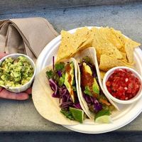 The taco meal - 2 vegan tacos, salsa, guac, and chips!   at Two Crows Tacos - Food Truck in Missoula