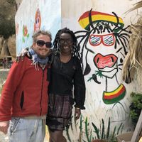 Davide and Michelle, the owners with their own Happy Cow❤️💛💚 at Mad Irie in Crete