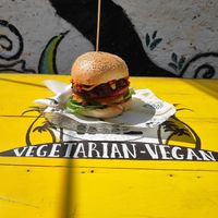 Huge burger with lots of veggies and love form amazing owners. at Mad Irie in Crete