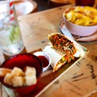 Salt and pepper tofu wrap, vegan halloumi in the foreground and cheesey chips at Hell Below in Carlisle