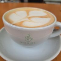 Oat latte at Noshi Coffee in Porto