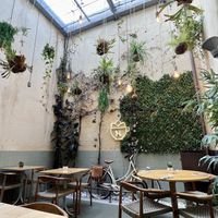 Dinning area in the back  at Noshi Coffee in Porto