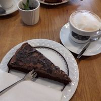 Cappuccino and chocolate cake 😍 at Die Gute Stube in Mainz