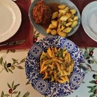 Penne with broccoli and Polish sauerkraut stew with potatoes at Meson Mudejar in Archez