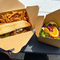 Cheesesteak, fries and salad   at Lola Rosa - Places des Festivals in Montreal