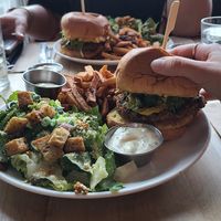 Burgers with Caesar Salad at Lola Rosa - Places des Festivals in Montreal