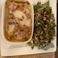 Lasagna with Caesar salad  at Lola Rosa - Places des Festivals in Montreal