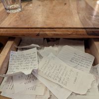 All the tables have little drawers that are filled with notes from previous patrons. at Lola Rosa - Places des Festivals in Montreal