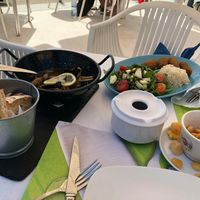 Mushrooms in garlic sauce and spinach croquettes at Vagas Bar in Matosinhos