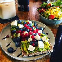 Avocado feta toast and side salad  at Velo Cafe in Interlaken