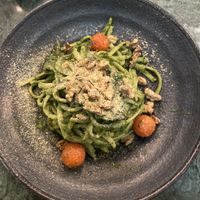 Linguine pasta pesto with 3 tomatoes and 2 mushrooms. Taste was good but disappointing about the few tomatoes and mushrooms.  at The Green Affair - Saldanha in Lisbon