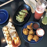 Vegtable gyozas, humus bread and carrots & cauliflower wings at The Green Affair - Saldanha in Lisbon