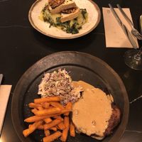 vegan take on traditional portuguese meal (‘fishy’ tofu and potato mash) and seitan steak at The Green Affair - Saldanha in Lisbon