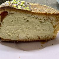 Inside pistache croissant  at Patisserie Chocolaterie Peigné in Lille
