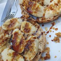 Bagel with nut butter, banana and syrup. at Samocca in Aalen