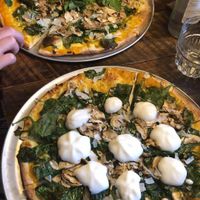 The two vegan pizzas together and top right is vegetarian nacho pizza.  at Otomat in Ghent