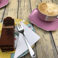 Veganer dark chocolate cake with (soy milk) cappuccino   at Isabella Glutenfreie Patisserie in Aachen