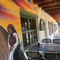 Outdoor seating & mural at Sugar Nymphs Bistro in Penasco