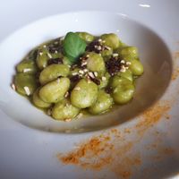 Vegan gnocchi with  green peas cream , dried tomatoes, pine nuts at Da Vinci Italian Restaurant in Aberdeen