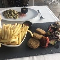 Burgers with side of fries at RossoVivo Primaluna in Malcesine