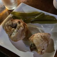 Tiny reheated apps the size of half a pickle (20ILS)  at Alf in Haifa