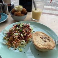 Lentil pot pie with side salad included, side order of bitterballen, and smoothie  at The Black Cockatoo in Almere