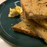 Bread with cultured coconut butter  at Kanu Cafe - Doppio Zero Pizza in Edmonton