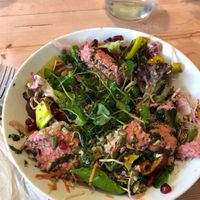 superfood salad: quinoa, roasted sweet potato, grilled broccoli, beet hummus, toasted seeds & more! at The Honey Pot in Penzance