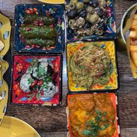 Stuffed vine leaves, olives, potato stew,   at Koocha Mezze Bar in Bristol