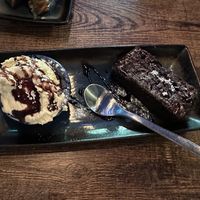 Warm Brownie and whipped cream   at Koocha Mezze Bar in Bristol
