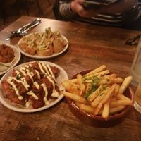 Mezze plus not needed but delicious chips at Koocha Mezze Bar in Bristol